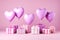 Heart shaped balloons with gift boxes flying on pink background for mothers day and valentines day