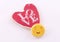 Heart-shaped biscuit with the word Love written