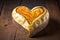 heart-shaped bread loaf with golden crust, filled with warm, gooey melted cheese