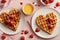 Heart-shaped breakfast waffles for Valentine's Day.