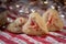 Heart shaped butter spritz cookies with red sugar sprinkles closeup heart bokeh selective focus