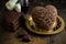 heart-shaped cake flanked by a stack of perfectly portioned chocolate truffles