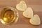 Heart shaped cheese and a glass of wine. Valentine`s Day