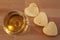 Heart shaped cheese and a glass of wine. Valentine`s Day