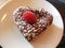 Heart-shaped chocolate tart dessert