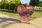 Heart-shaped container for recycling plastic caps