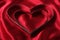 Heart Shaped Cookie Cutters on Red Satin