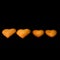 Heart-shaped cookies in descending order isolated on a black background