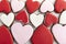 Heart shaped cookies with red  pink and white sugar icing. Close up. Macro. Valentines day treat