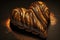 heart-shaped croissant filled with rich chocolate or creamy almond paste, drizzled with chocolate