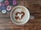 Heart shaped design on a cappuccino coffee