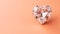 Heart shaped diamond with exquisite detail on peach background, free copy space for text or design