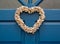 Heart shaped door wreath made from shells