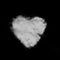 Heart shaped fluffy cloud isolated on black.