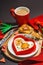 Heart-shaped fried egg served with toasted bread. Romantic art food idea for Valentine\\\'s breakfast