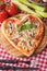 Heart shaped funghi pizza