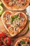 Heart shaped funghi pizza