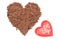 Heart shaped grated chocolate on white background