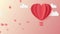 A heart shaped hot air balloon flies in the sky. Origami hearts fly are falling. Motion vector graphics. Valentine`s Day animatio