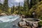 Heart shaped hotsprings near the mountain river