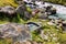 Heart shaped hotsprings near the mountain river