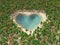 Heart-shaped lake in the middle of tropical paradi