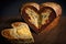 heart-shaped loaf with a slice of rich, gooey cheese baked inside