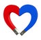 Heart shaped magnet. Concept Love attracts. Blue-red heart.