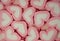 Heart shaped marshmallows as background. Fluffy marshmallows texture close up.