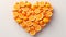 Heart shaped orange slices, Fruity love motif made of orange, isolated on pastel background.