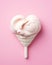 heart shaped pink ice cream on pink background