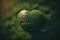 A Heart-Shaped Planet on Green Grass to Celebrate Earth Day. AI