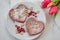 heart shaped red velvet pancakes on a table