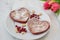 Heart shaped red velvet pancakes on a table