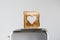 Heart shaped on roasted toasted bread in a toaster. Breakfast preparation on Valentine`s Day. symbol sign of love. Concept.