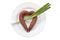 Heart-shaped sausage with onion arrow