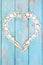 Heart Shaped Seashell Wreath on Rustic Wood