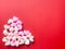 Heart shaped Styrofoam on red background