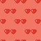 Heart shaped sunglasses seamless pattern in red color. textile design. exotic fashion trend. repeat vector pattern