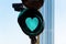 Heart shaped traffic light on the street