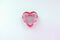 Heart shaped transparent red crystal Love concept. Minimalism.  Romantic card  heart. Creative laconic art design, wallpaper.