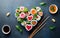 Heart shaped Valentine day sushi set. Classic sushi rolls, philadelphia, maki set for two, with two pairs of