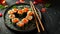 Heart shaped Valentine day sushi set. Classic sushi rolls, philadelphia, maki set for two, with two pairs of