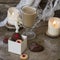 Heart shaped Viennese chocolate and vanilla Valentine`s Day cookies with a glass cup of coffee with milk on a wooden background