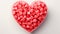 Heart shaped watermelon pieces, Fruity watermelon love motif, isolated on pastel background.