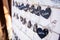 Heart Shaped Wedding Guests Paper Name Tags on Board