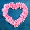 Heart shaped wreath decorated artificial flower made pink tissue paper napkins