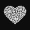 Heart of shiny diamonds on black background
