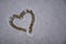 Heart in the snow. The heart is drawn with your finger on the newly fallen snow. Snow Declaration of love. Beginning of winter