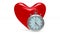 Heart and stop watch on white background